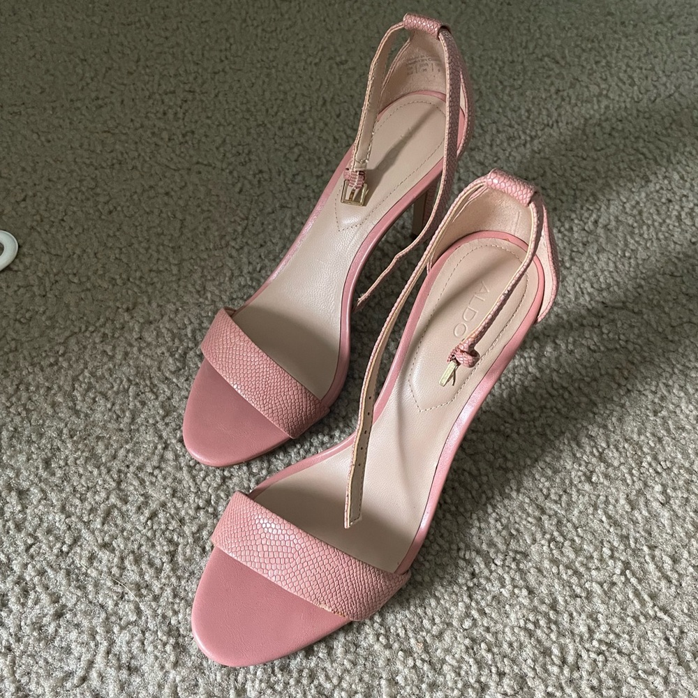 Pink snakeskin heels